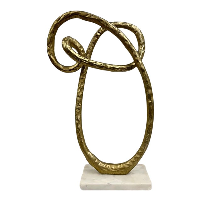 Contemporary Textured Gold Metal Abstract Nomad's Knot Sculpture on White Marble Base For Sale