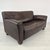 Dimensions: H 32” x W 62.5” x D 34” x SH 17” Vintage Ds 97 brown leather two-seater sofa from De Sede. Produced in...