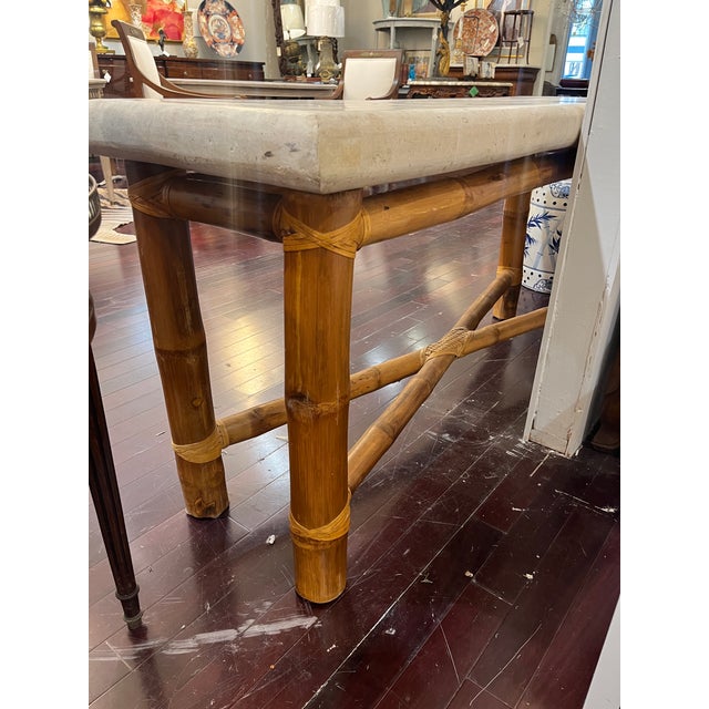Mid Century Bamboo and Travertine Console Table with X stretcher and Rattan tied joints. Commonly referred to as Elephant...