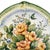 A fantastic late 20th century Italian faience wall plaque by Arte Italica featuring a hand-painted still life of lush,...