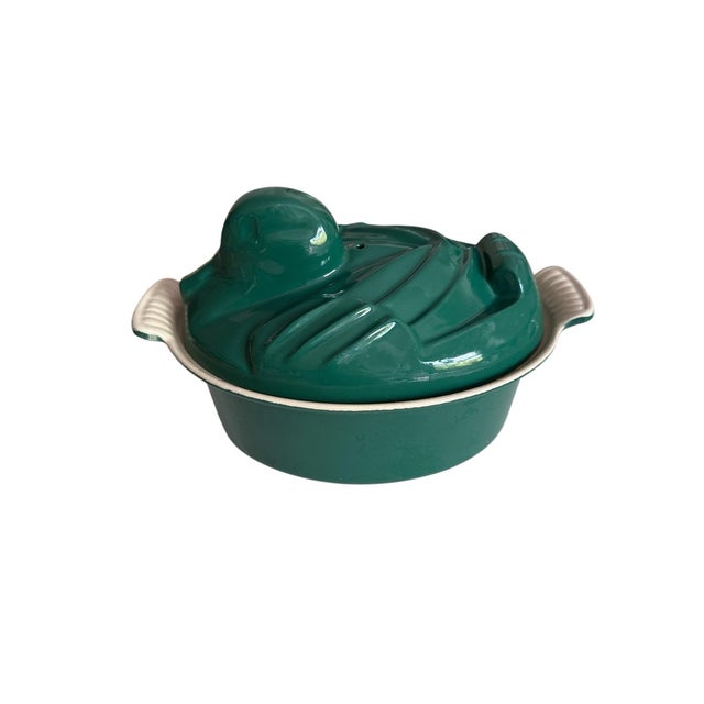 An exceptionally rare and highly collectible vintage Le Creuset duck tureen, beautifully rendered in a rich emerald green...