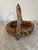 Vintage Artisan Made Rustic Woven Basket With Live Branch Handle and Twig Details.
