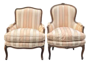 Early 20th Century Coordinating Pair of French Bergere Chairs - Made in Italy