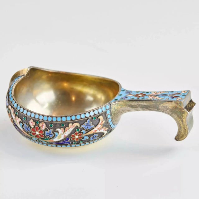 Russian silver kovch with floral enamel decoration on a dark background, gilding and with a dominant blue tone. Hallmarks:...