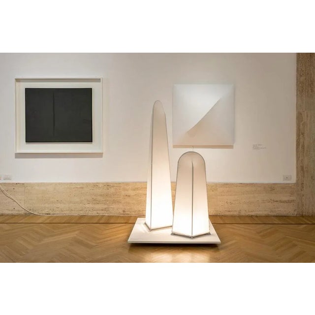 This large version of Wall lamp reminescent Lucio Fontana cuts, was produced by Sirrah,Italy,1973 and designed by Kazuhide...