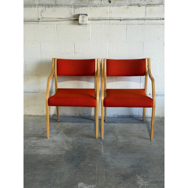 This pair of armchairs features curved bentwood frames and supportive armrests. Vintage Mid-Century Modern 1970s. Crafted...