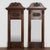 Pair of mahogany mirrors from Denmark, circa 1840-1860, with a carved and scrolled pediment and turned side columns. This...