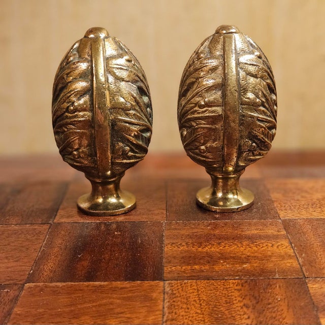 Lovely pair of vintage heavy brass drapery finials. Threaded inside for mounting screws. 3.5" long by 2" diameter....