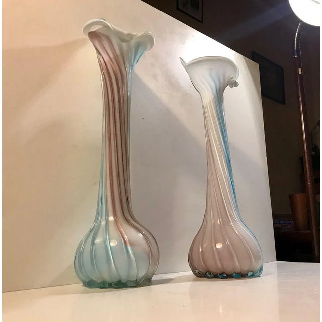 A pair of 'Jack in the Pulpit' vases in cased and twisted Murano Glass. Anonymous Glass Studio/designer in Murano or...