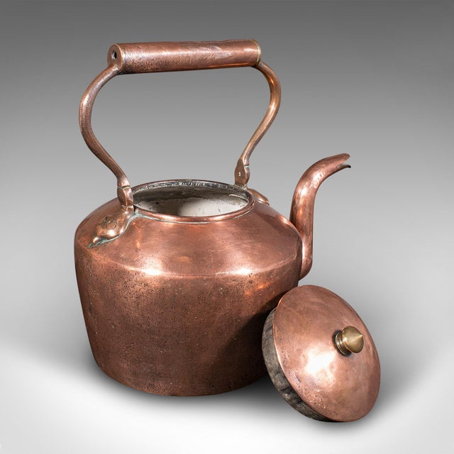 This is a charming antique fireplace kettle. An English, copper hearth warmer with fine form and character, dating to the...