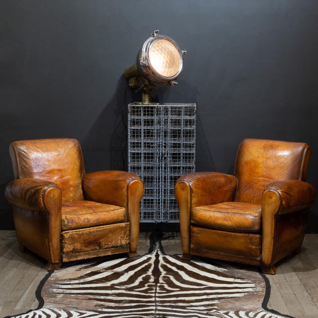 ABOUT Antique French wine cage with two locking doors. The cabinet has a total of 50 cubicles. 25 hold regular wine...