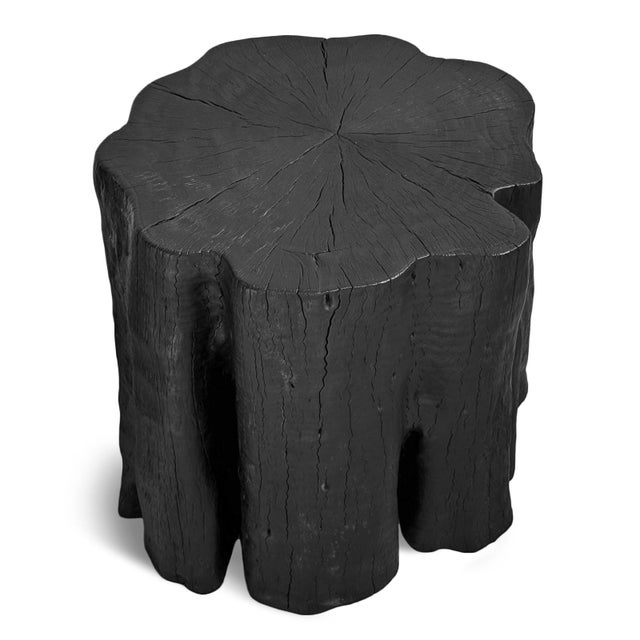 Solid lychee wood stump stool or side table. Attractive modern black finish subtly highlighting the natural wood grain....