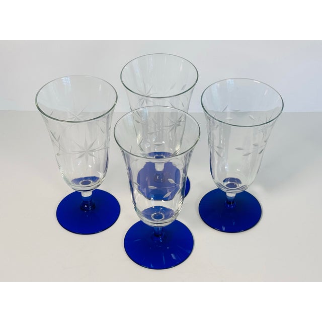 Bring timeless elegance to your table with this stunning set of four vintage water stems from the 1960s. Featuring...