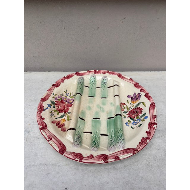 Majolica asparagus plate with flowers, each plate have differents flowers signed Longchamp, circa 1890.