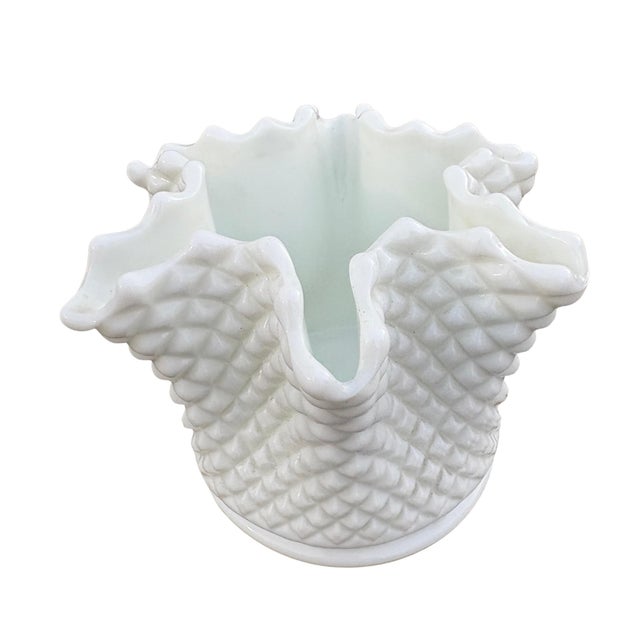 This vintage Westmoreland milk glass handkerchief vase features a textured diamond hobnail pattern and a ruffled, crimped...
