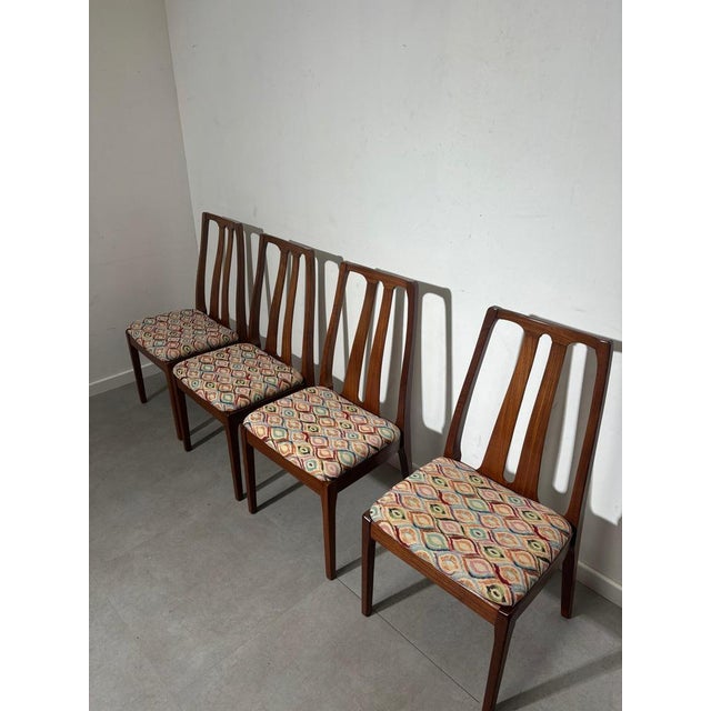 Set of four Nathan Dining chairs Newly upholstered.