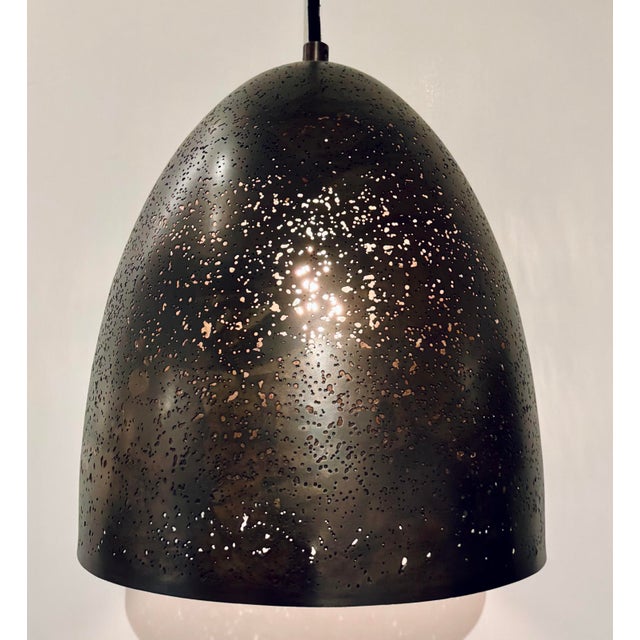 Stylish Revelation Modern Bronze Pierced Darsh Pendant Light, showroom floor sample