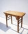Constructed from solid elm wood, this altar table features a rectangular top with subtle everted flanges and a flush-panel...