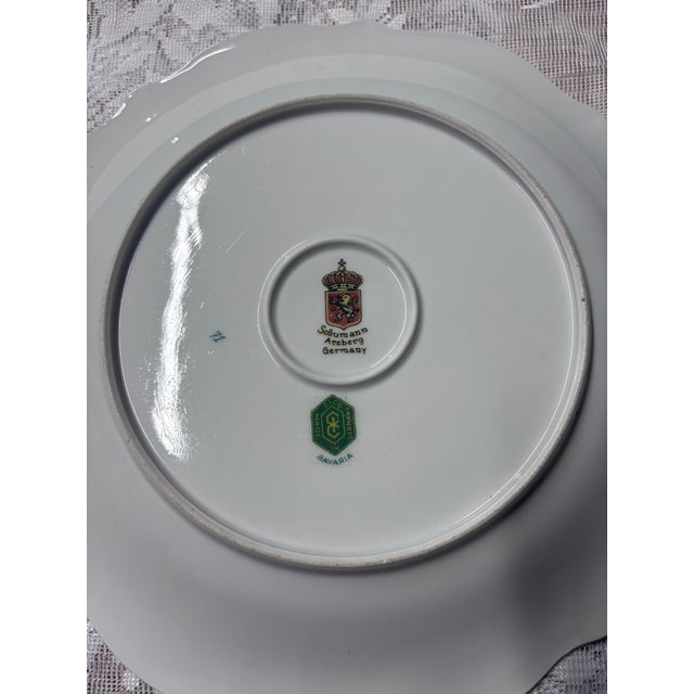 This exquisite vintage plate is a beautiful example of mid-century Bavarian porcelain craftsmanship, made by Schumann...
