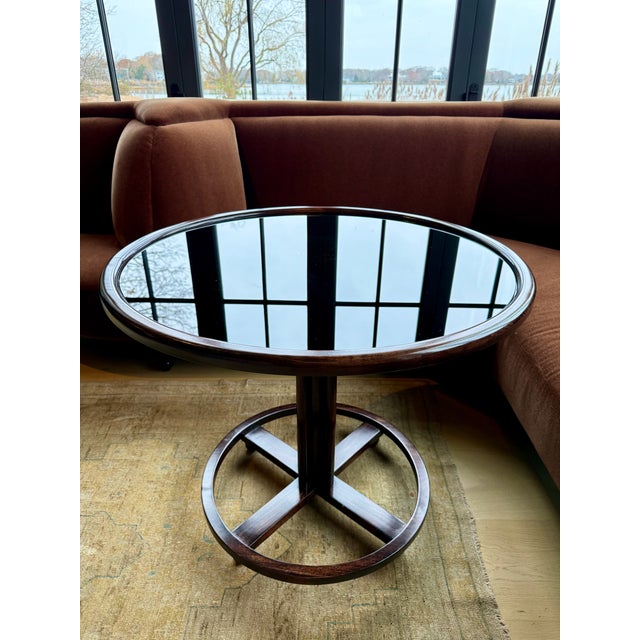 Bentwood café tables were popularized by Michael Thonet, an Austrian cabinetmaker, in the 1850s. His innovative bentwood...