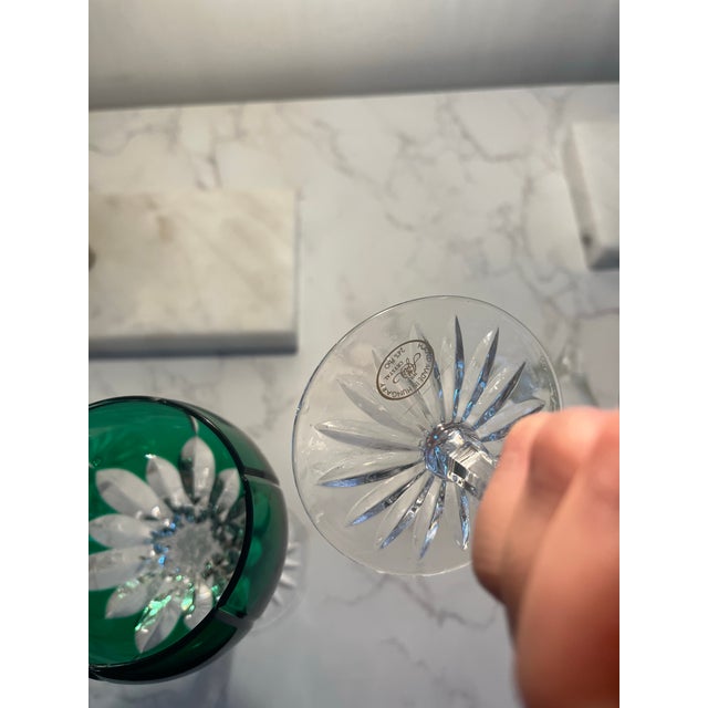 Exquisite glasses. Colors and design. Each has different color. Red, purple, and green