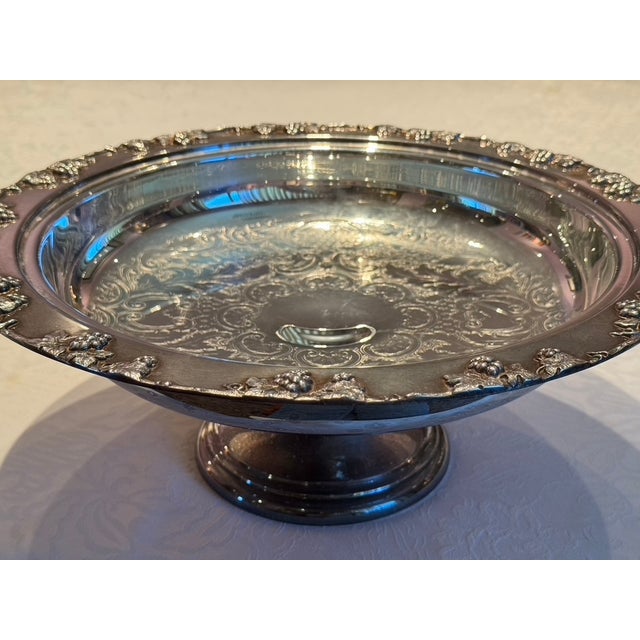 An exceptional vintage mid-century modern footed pedestal serving platter and centerpiece bowl manufactured by the...