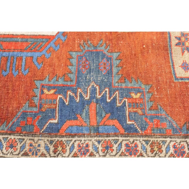 The numerous rugs of the famous NW Persian weaving district, from small scatters to giant carpets and a few runners, in...