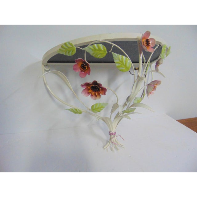 Italian tole wall shelf , paint decorated , metal flowers and leaves , mirrored glass top