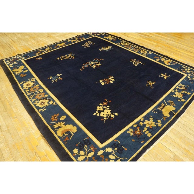 Antique Chinese Allover Floral Hand Knotted Pile Rug, Country of Origin: China, Circa Date: 1900s. This exceptional...