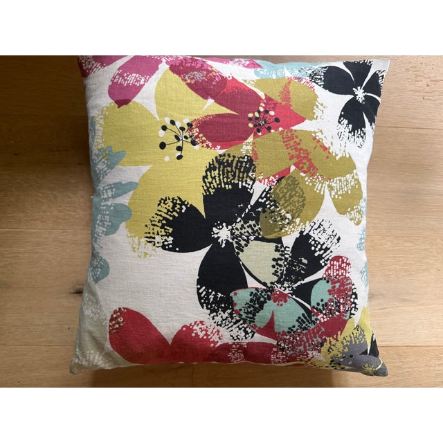 Set of 2 down filled throw pillows in graphic large scale floral print. Overlap closure removable covers.