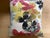 Set of 2 down filled throw pillows in graphic large scale floral print. Overlap closure removable covers.