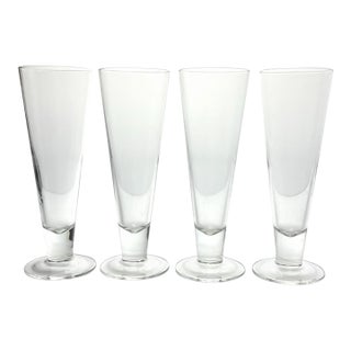 Contemporary Crate & Barrel 4 Footed Beer Pilsner or Fluted Champagne Glasses - Set of 4 For Sale
