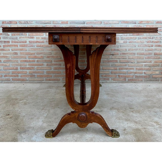 Mid-Century Modern Convertible Dining Table with Claw Legs and Folding Leaf. You can use the table as a console table or...