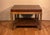 Mid Century walnut two-tiered side table by Lane, Altavista, Virginia. Part of the “Rhythm” collection dated 1968.