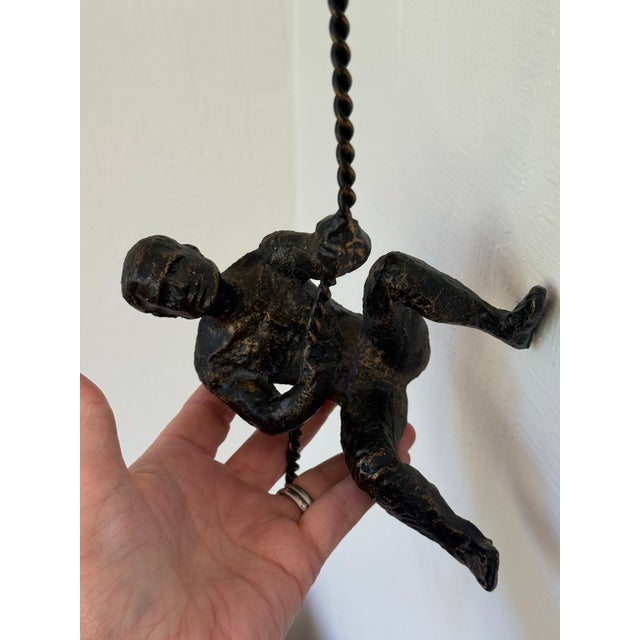 Vintage Modernist Cast Metal Hanging Sculpture of a Man Climbing For Sale - Image 11 of 12