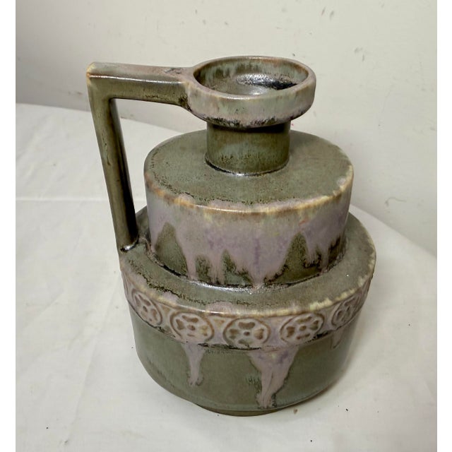 This Antique Art Deco Ceramic Pottery Jug by P. Garnier, Enghien, France, from the 1920s is a beautifully crafted piece....