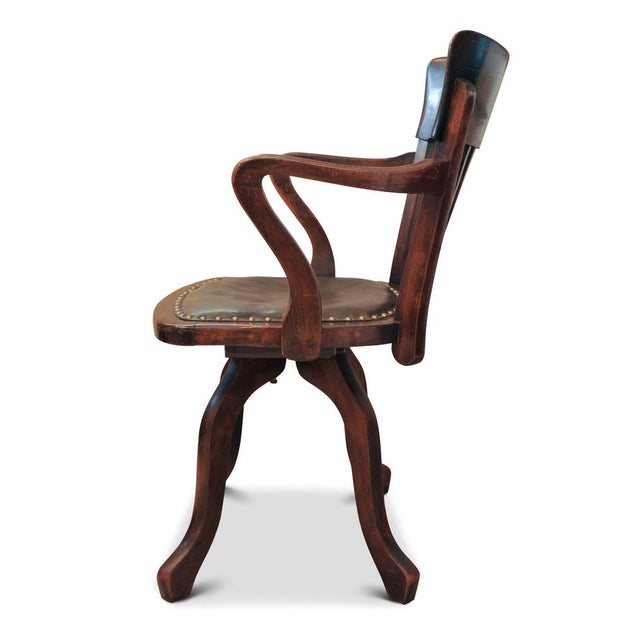 Victorian Oak & Leather Rail Back Revolving Desk Chair with Stud Detailing with a dark Olive green seat. Height to top of...