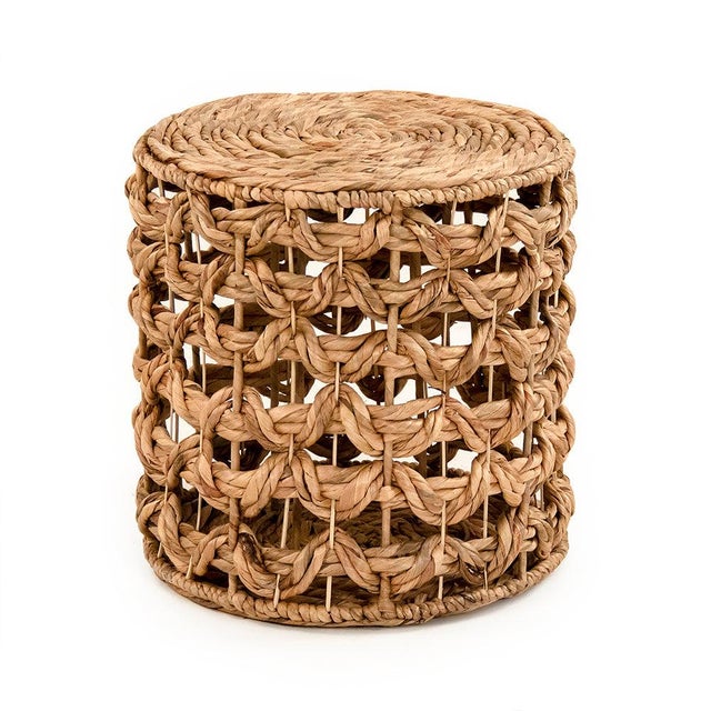 The Woven Pouf from Zentique is a handwoven stool in natural water hyacinth. The item works as extra seating, footrest, or...