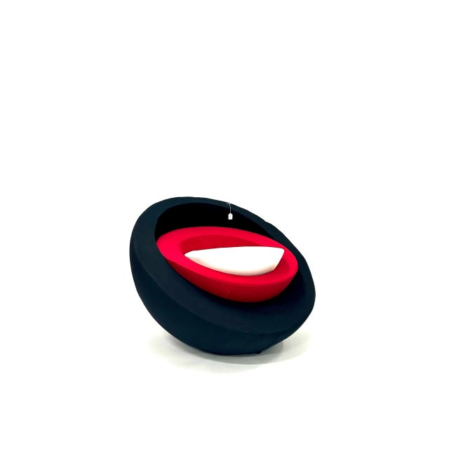 The S.3 armchair by Felice Rossi, designed by Carlo Magnoli and David Gelati, is a designer piece with semi-spherical and...