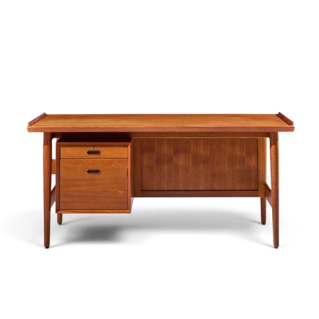 Arne Vodder for Sibast Mid Century Danish Teak Executive Desk This desk measures: 62.75 wide x 31.5 deep x 29.5 high, with...