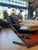 Vintage mid-century Italian chrome and black leather swivel office chair. In the style of Jerry Johnson. Rare V-shaped...