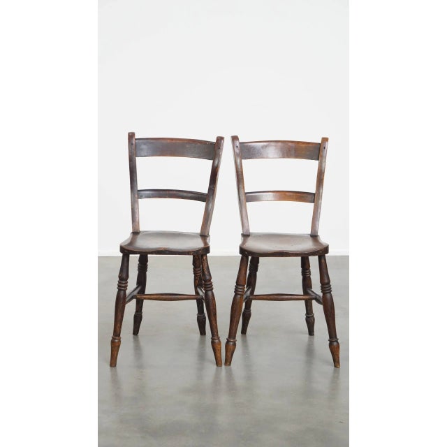 We are offering this timeless, stylish set of 4 antique English Oxford dining room/kitchen chairs in a warm color scheme....