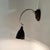 Small wall lamp made of bakelite and metal with adjustable shade. Original, fully functional wiring. Bulb: 1 x E14. US...