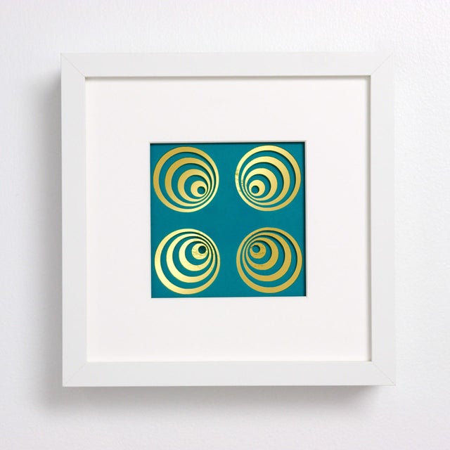 Royal Malachite features an intricate composition of hand-cut, suspended, and layered colored paper, creating a dynamic...
