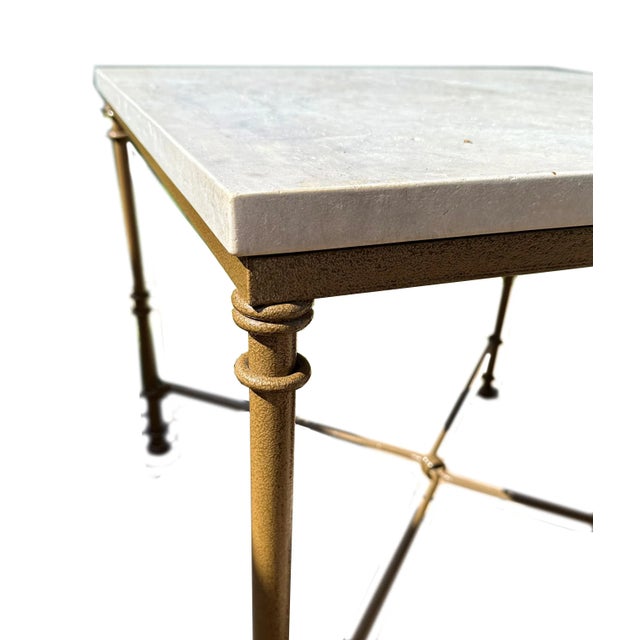 Giacometti-style hand-forged iron and travertine game table, customized exclusively for THE TASTEMAKER SHOPPE! The top is...