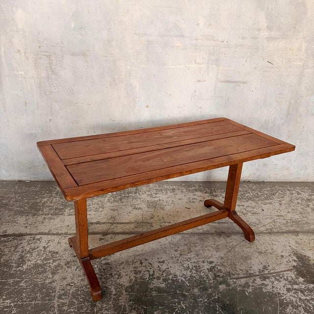 A beautifully proportioned Art Deco tiger oak coffee table , attributed to Heals , showcasing the understated elegance and...