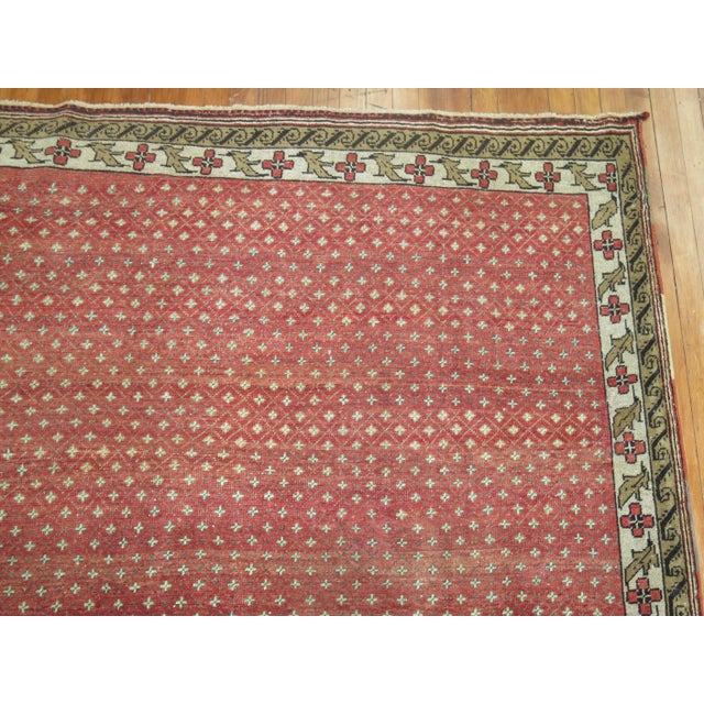 Room size mid-20th century Anatolian rug in crimson red. 7' x 9'7''