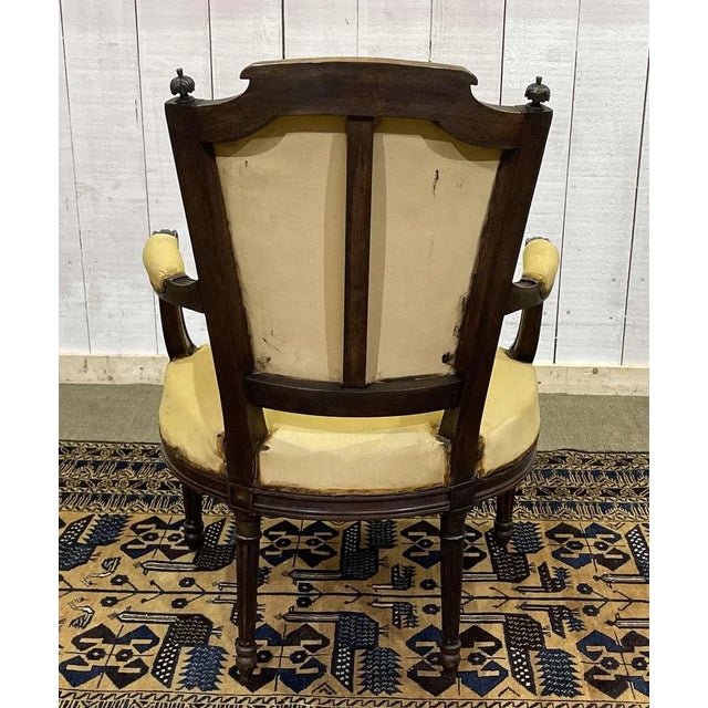 Louis XVI style armchair in late 19th century beech - L=61cm HD=90cm HA=40cm P=50cm.