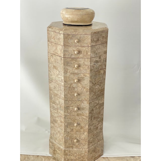 A striking vintage Maitland-Smith tall jewelry chest, handcrafted in the Philippines circa 1980s. Featuring an...