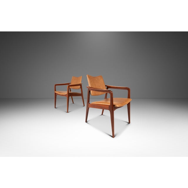 This rare and elegant pair of Model 132 accent chairs was designed by Sigvard Bernadotte for France & Son (France &...